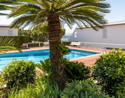 GRIFEU 15.1 – Semi-detached house with communal pool and views